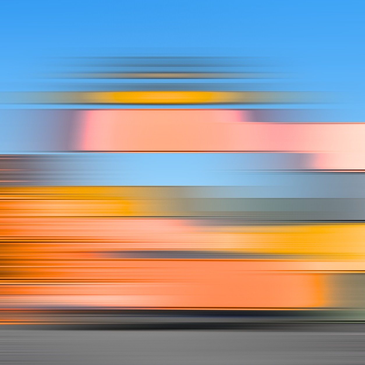 An abstract motion blur in orange and blue